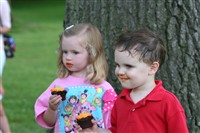Miller Boy Oldest With Ruth Anns Youngest Daugher Eating Cupcakes 1