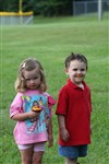 Miller Oldest Boy With Ruth Anns Youngest Daugher Eating Cupcakes 2